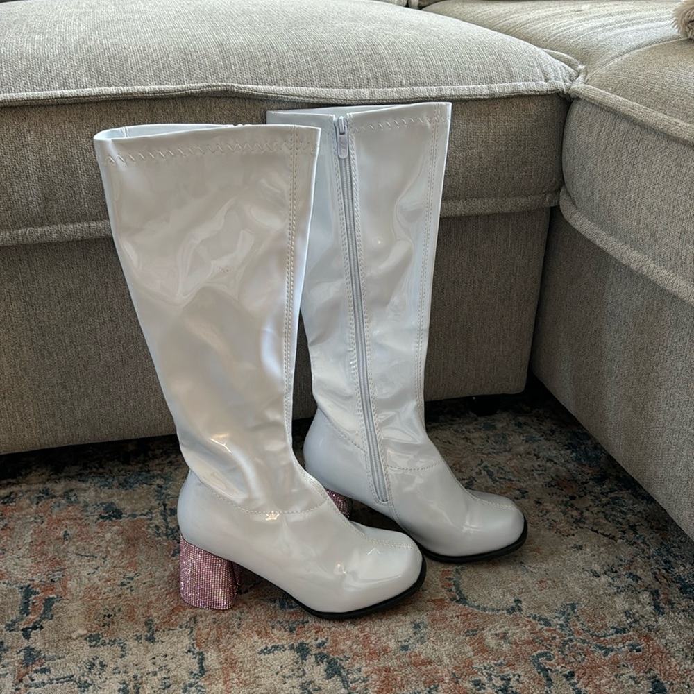 White plastic costume boots